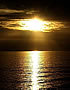 To read Sherif Michael's Testimony click this beautiful thumbnail photo of the public domain copyright free photograph of the sun in the clouds over the ocean like God's Eye watching over us and beckoning us to seek him out. 
